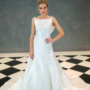 Estee Couture Sky Wedding Dress - Romantic Modern Modified A-Line Bridal Gown with Natural Waist, Square Neck, Straps, Low Back, Bow Detail and Silk Mikado Fabric.