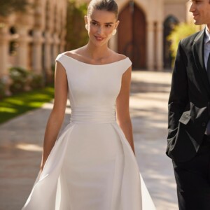 Rosa Clará Odrin Wedding Dress - Romantic, Clean Modern Fit and Flare Bridal Gown with Princess Seams, Bateau Off the Shoulder Neckline, Low Back and Detachable Overskirt. 