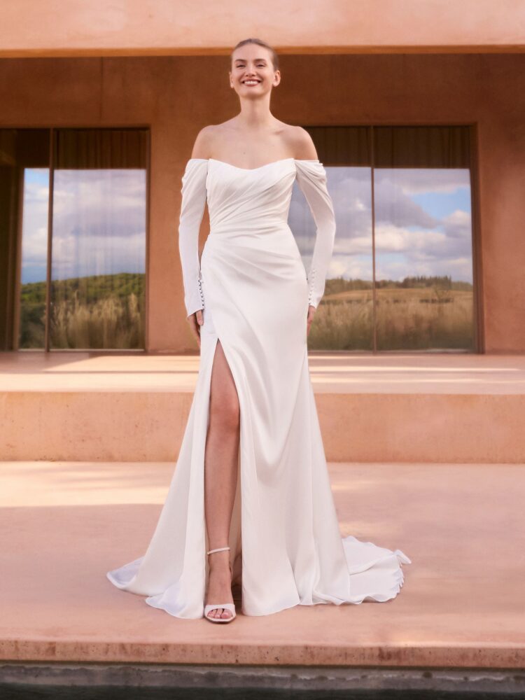 Pronovias Verdiana Wedding Dress - Romantic Clean Modern Mermaid Bridal Gown with Natural Waist, Sweetheart Strapless Neckline, Long Detachable Sleeves, and Rouching Details in Satin Fabric. Front