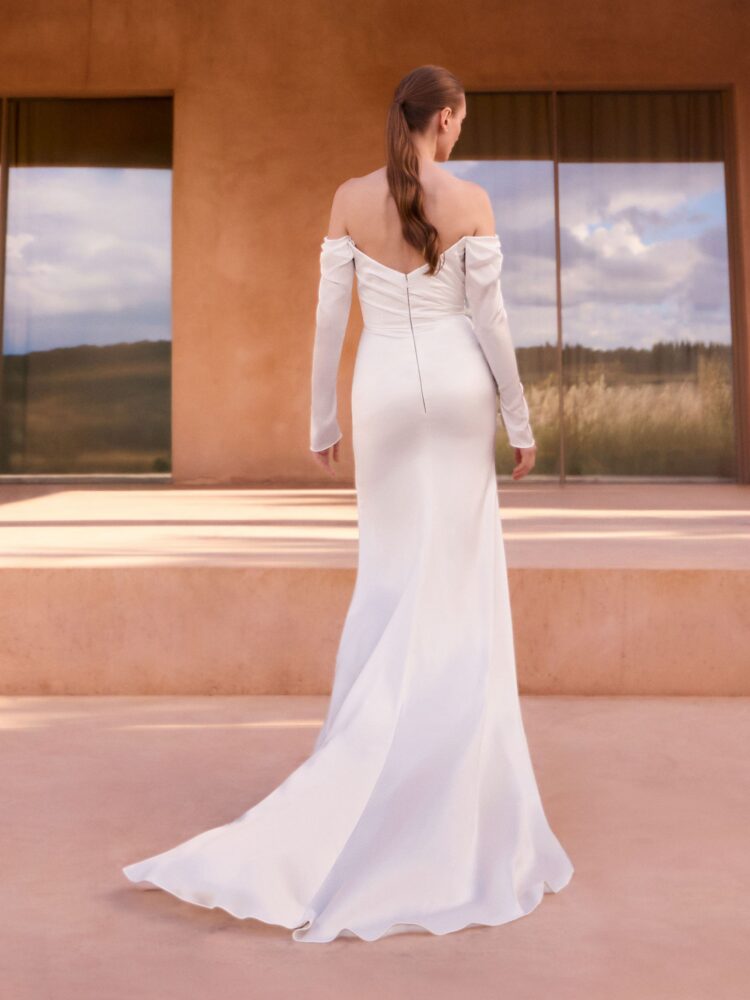 Pronovias Verdiana Wedding Dress - Romantic Clean Modern Mermaid Bridal Gown with Natural Waist, Sweetheart Strapless Neckline, Long Detachable Sleeves, and Rouching Details in Satin Fabric. Back