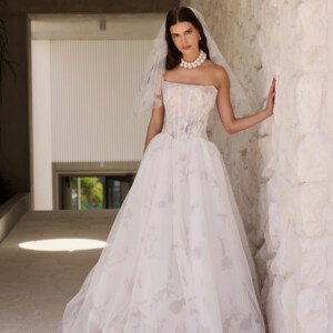 La Premiere Dorothy Wedding Dress - Couture Romantic Sexy A-Line Bridal Gown with Drop Waist, Straight Strapless Neckline, Corset Details and Floral Fabric.