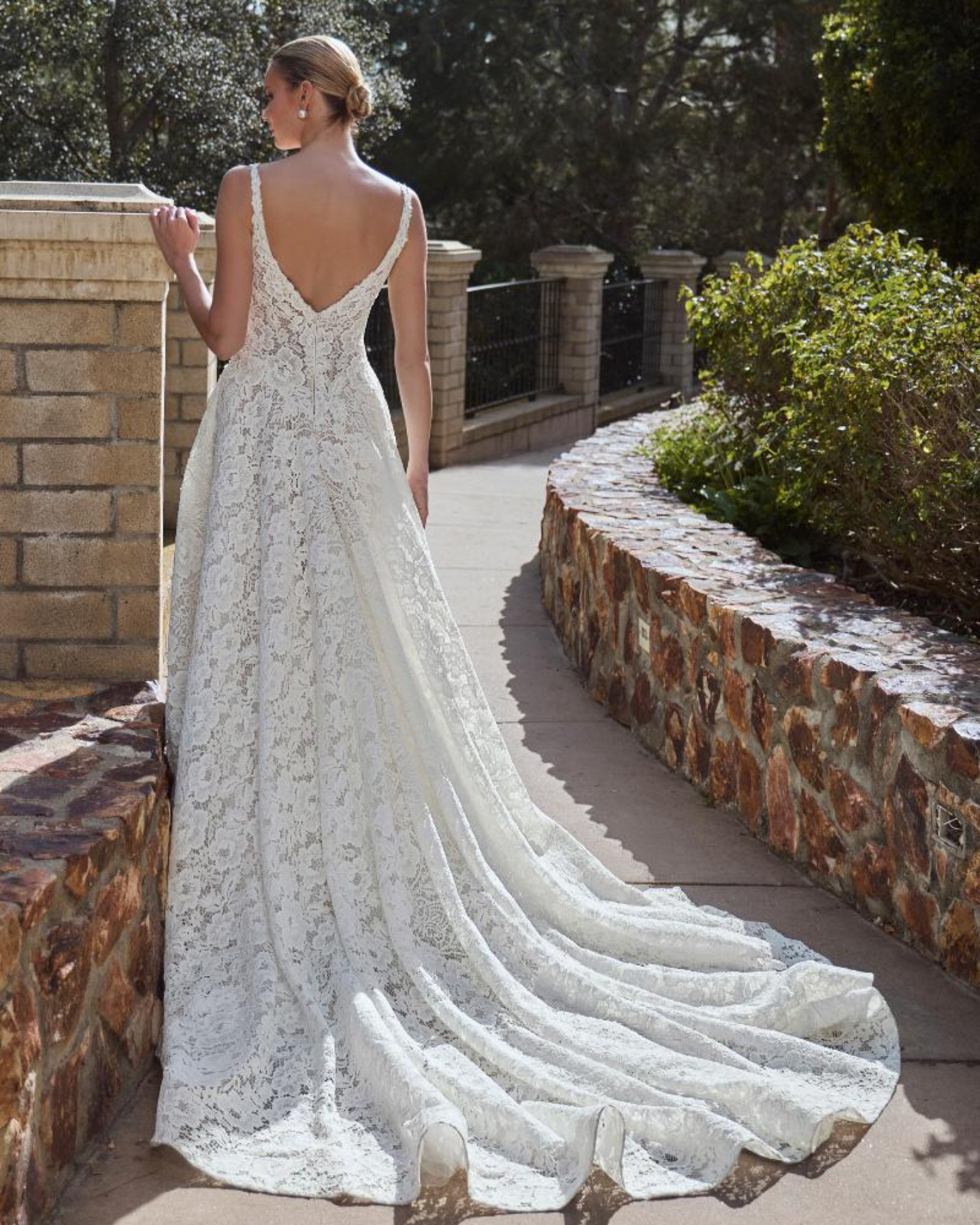 Calla Blanche Dara Wedding Dress - Romantic Sexy Corsetry A-Line Bridal Gown with Drop Basque Waist, Straight Neck, Straps, Low Back, Floral Details and Lace Fabric.