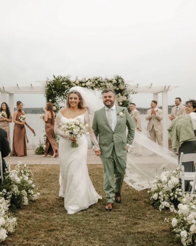 The gallery is finally here!!! 🩷🌷🌸

Our #weddingateliernycbride Amanda looked absolutely beautiful on her wedding day in the ‘Camomile’ dress by @suzanneneville, a stunning off the shoulder, lace long sleeve gown. So perfect for her.

The couple celebrated their special day at the Ocean Cliff Hotel, surrounded by the most beautiful waterfront views, warm earthy tones, and so much love in every single photo. 

It was so hard to pick just 10 photos so stay tuned for Part 2! ✨🤩

Bride: @mandyroke
Wedding dress boutique: @weddingatelier_nyc
Wedding dress designer: @suzanneneville
Photo & Video: @talesofsonder
Second Photographer: @hfitchphotography 
Planner: @ashleylynnweddingsevents
Venue: @oceancliffnewport Florals: @plant.girl.floral Make-Up: @sydtess Hair: @kauriandco Catering: @oceancliffnewport DJ: @epicentboston Dessert: @confectionerydesigns Rentals: @art_in_ice @casino_productions Transportation: @experiencerhodeisland Caricatures: @MarkPenta @MarkPentaCaricatures

#weddingateliernyc #suzannenevillebride #suzanneneville #newportwedding